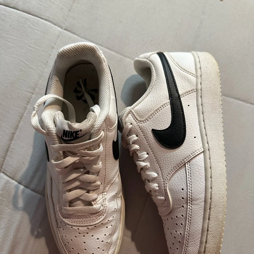 Nike Cream and Black Low-Top Sneakers